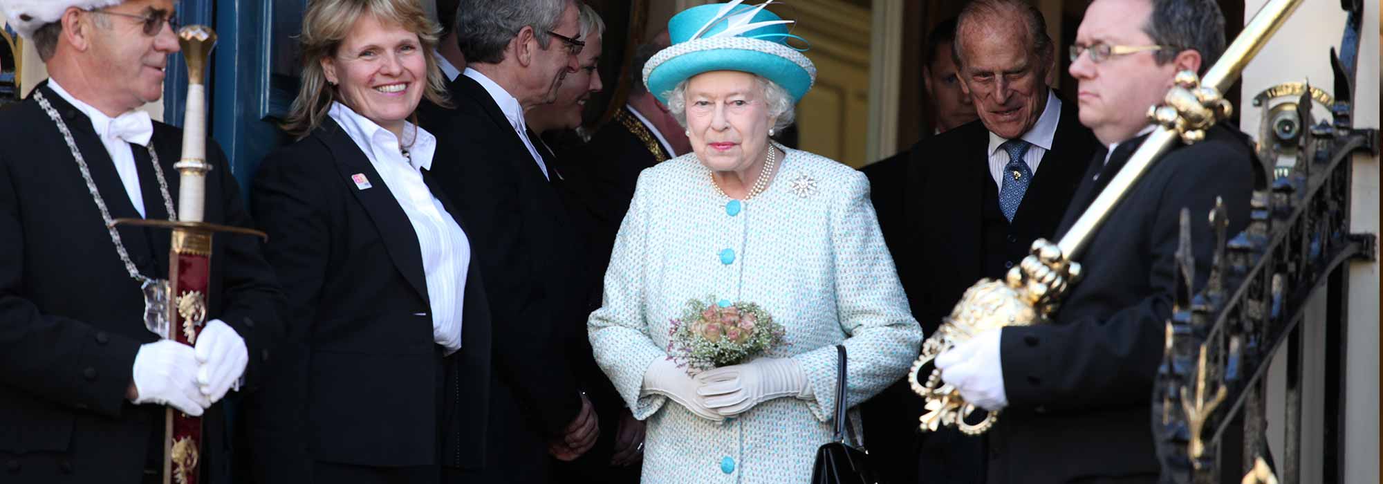 Queen Elizabeth II walking past the Civic party.