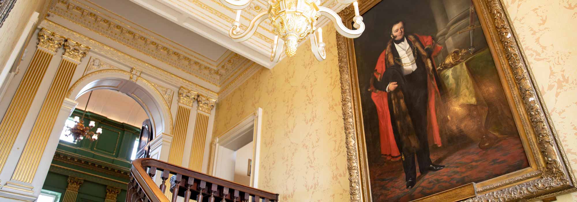 A view of a portrait of The Railway King from below.