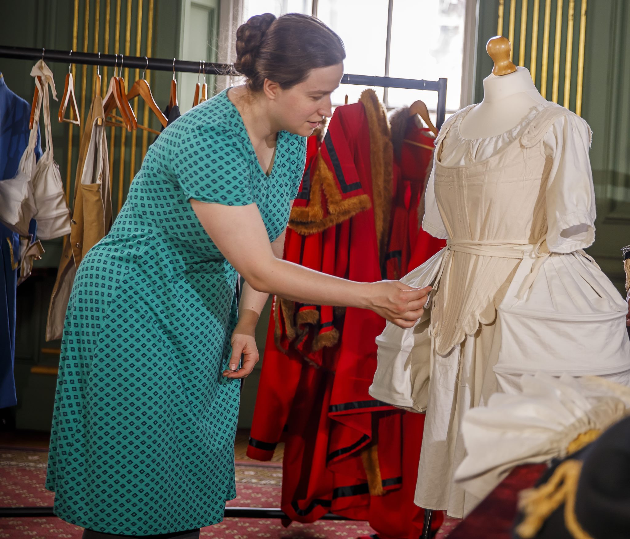 Photo of a lady watching at a georgian dress