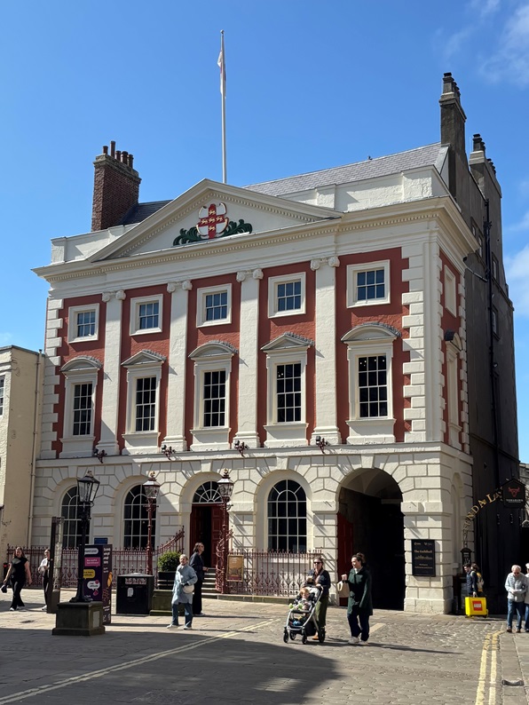 a view of mansion house from the street
