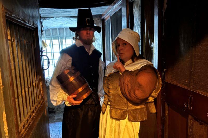 People dressed as Guy Fawkes times characters